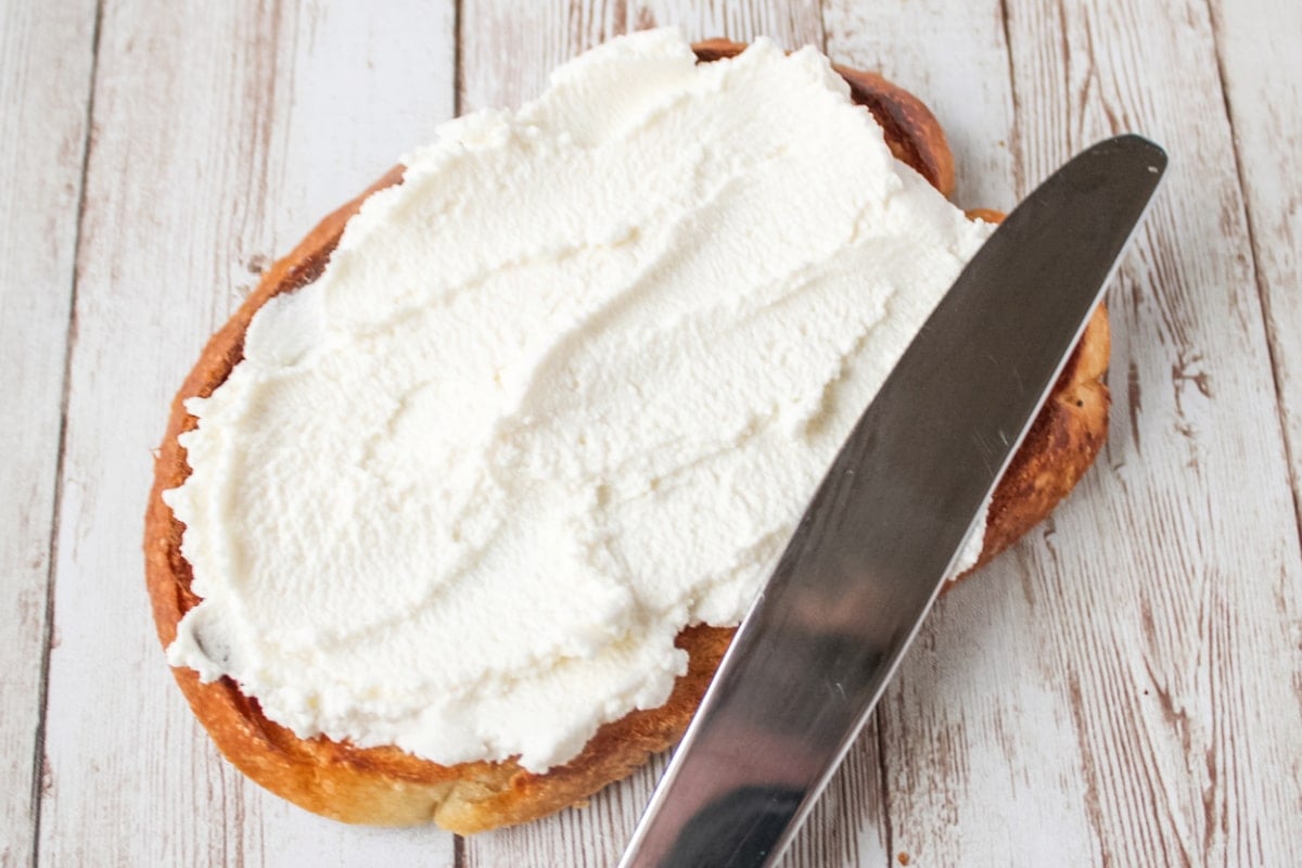 ricotta spread on toast with butter knife