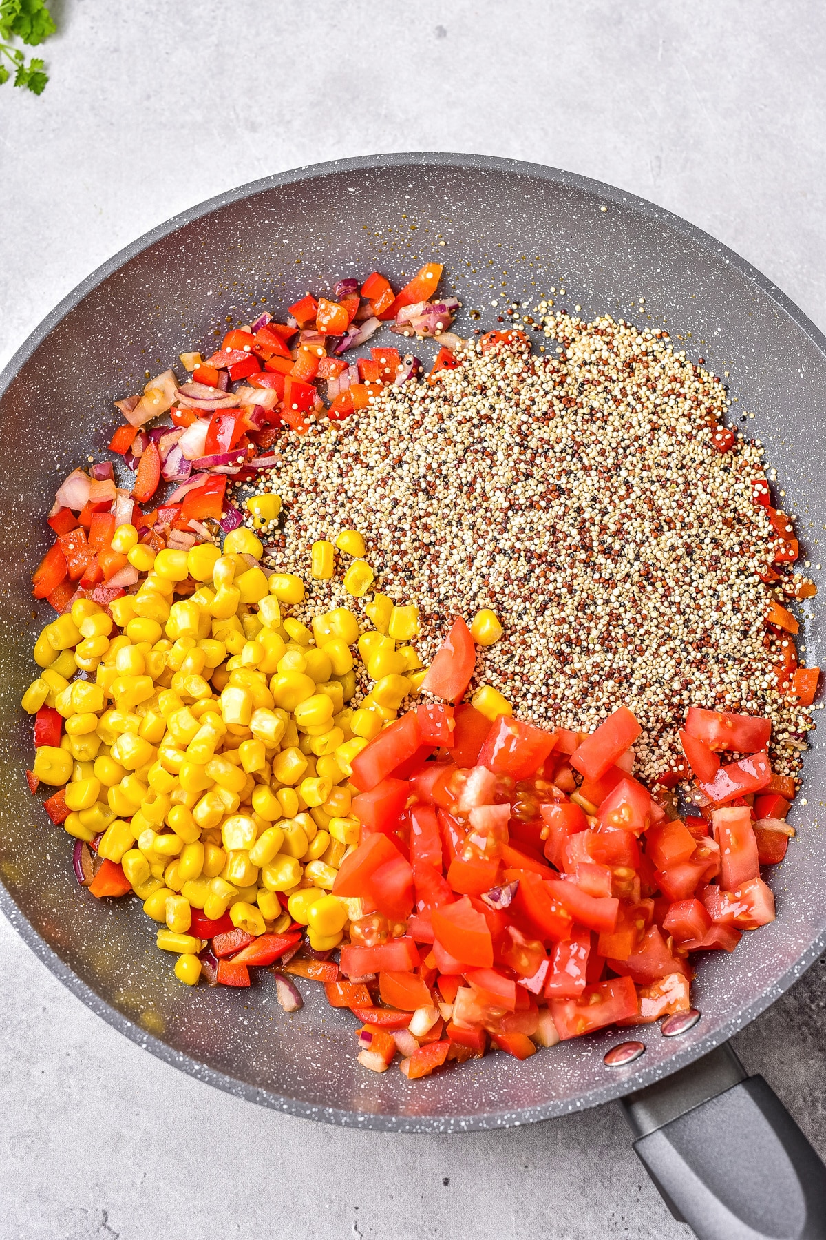 stir in corn tomatoes and quinoa