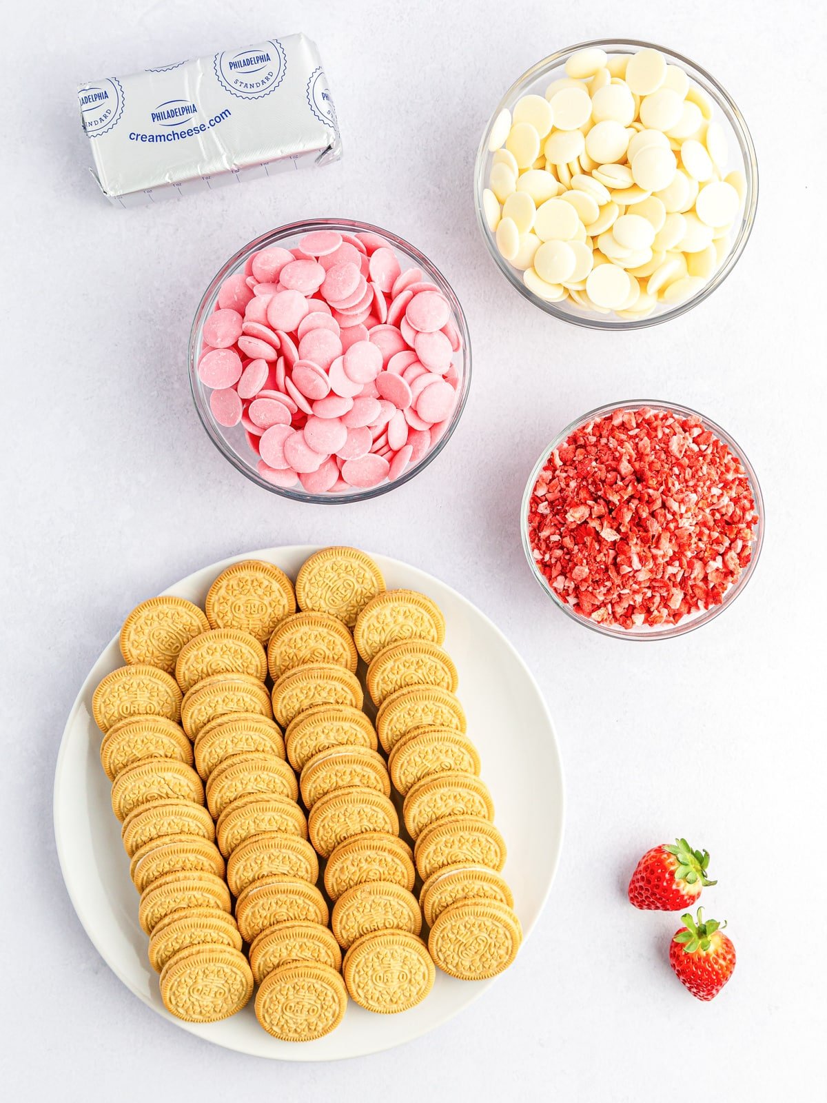 strawberry crunch cookie ball ingredients in prep bowls