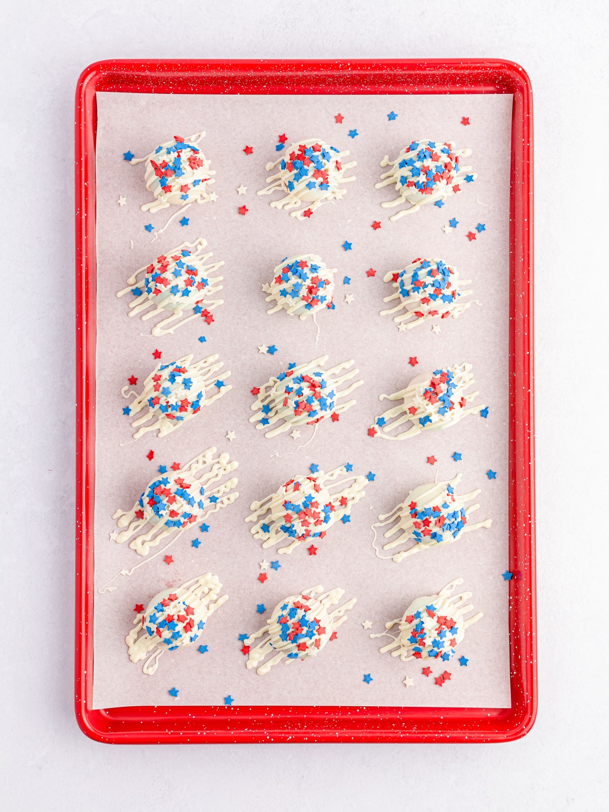 White Chocolate dipped Patriotic Cake Balls with star sprinkles