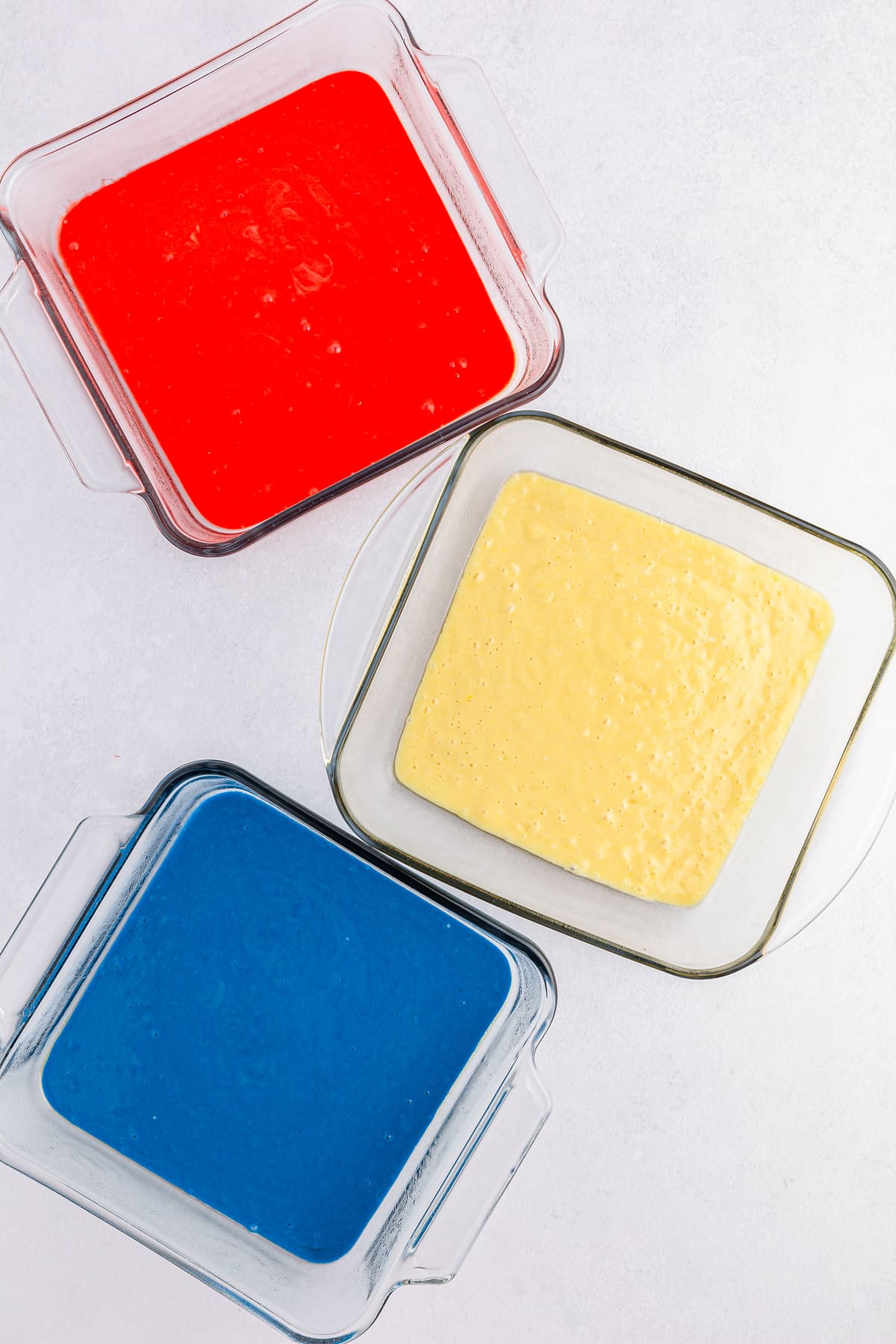 red while and blue cake mix in baking pans