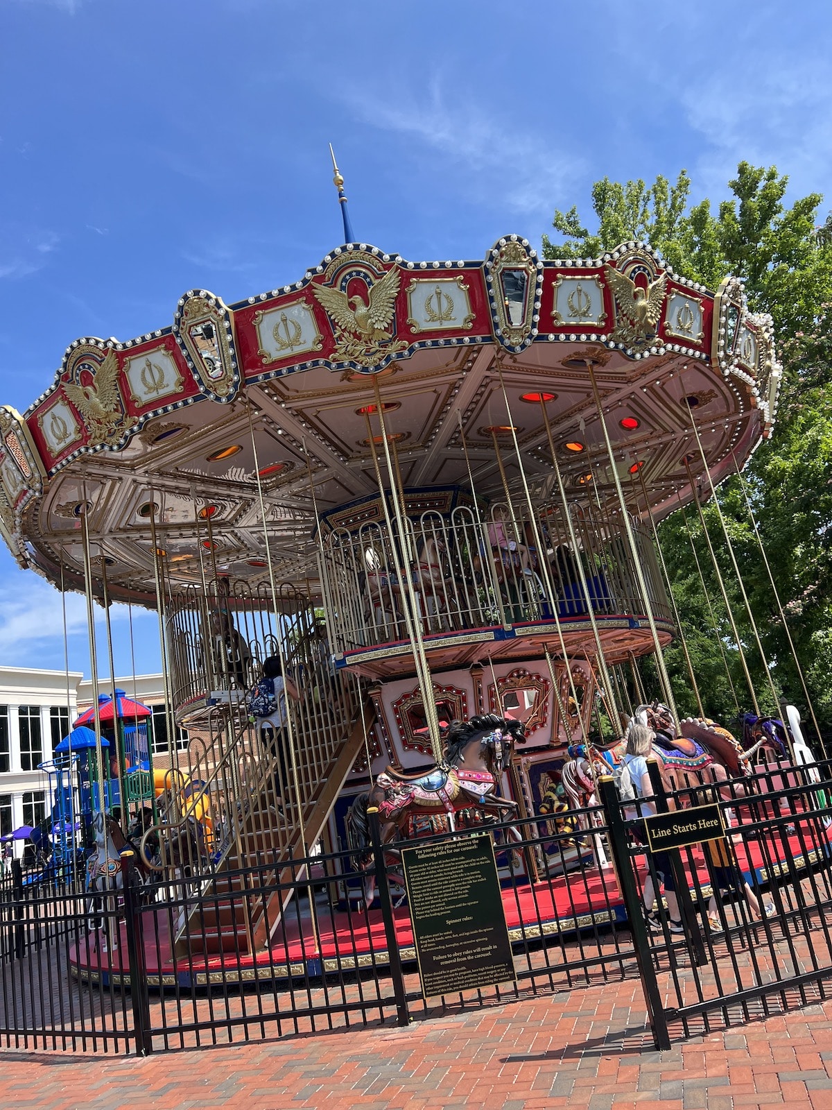 A carousel in a park.