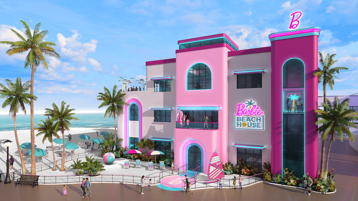 A colorful barbie-themed beach house resort with neon accents and palm trees overlooking the ocean.
