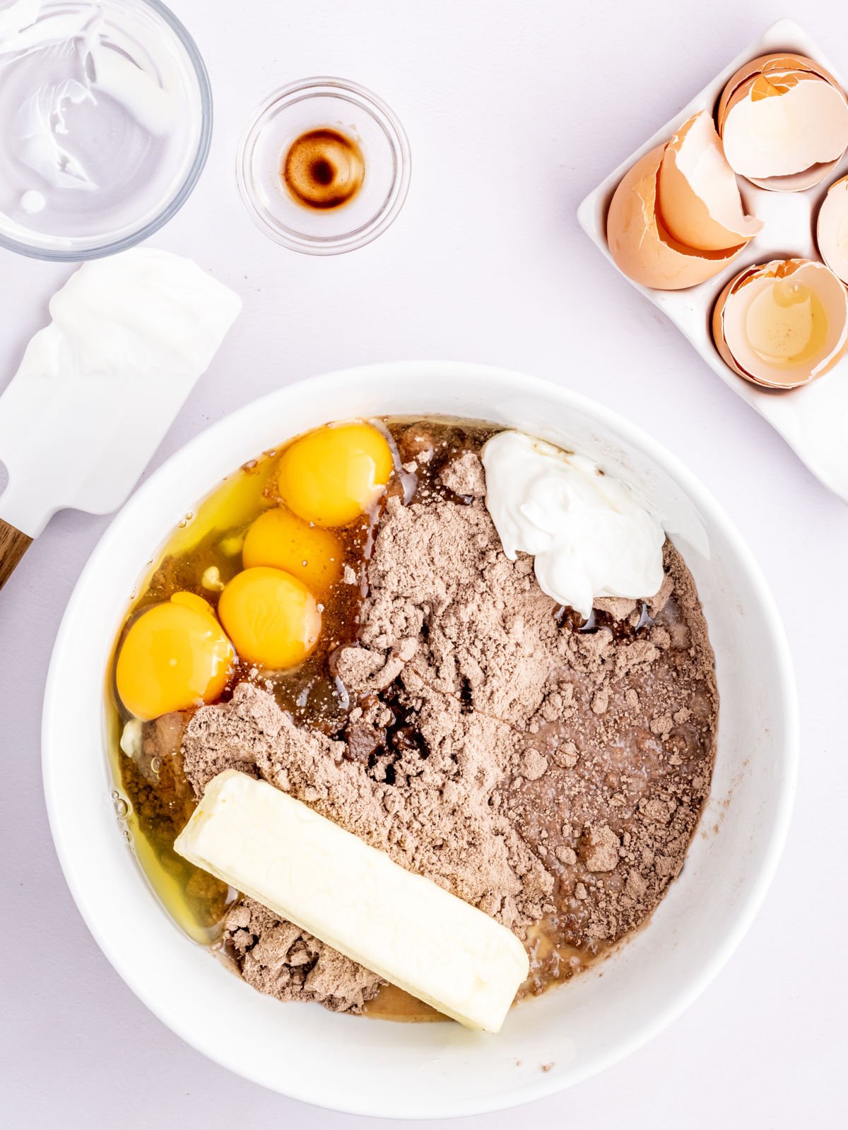 raw cake ingredients in a mixing bowl