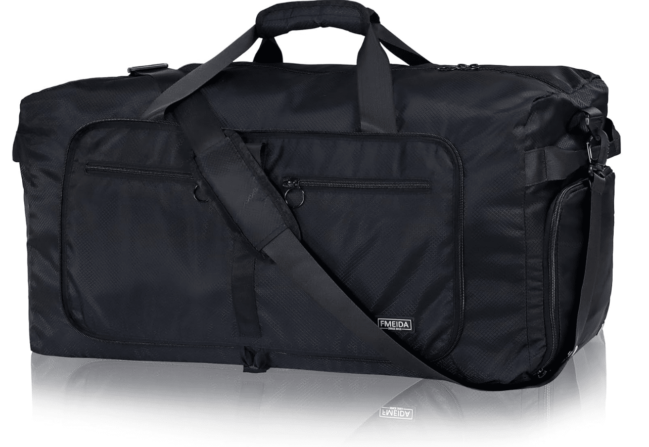 A large black duffel bag with multiple zippered compartments, a shoulder strap, and carrying handles, set on a white background.