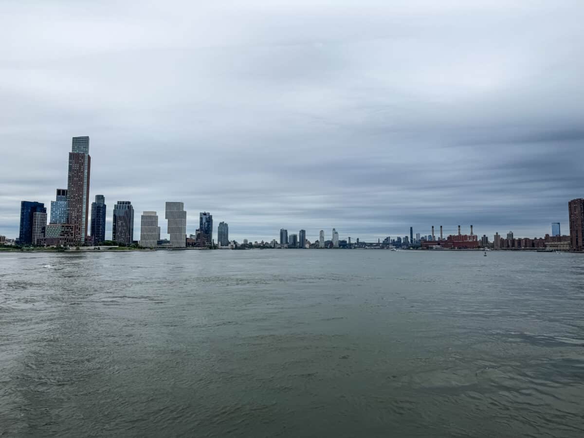 A city skyline with a body of water.
