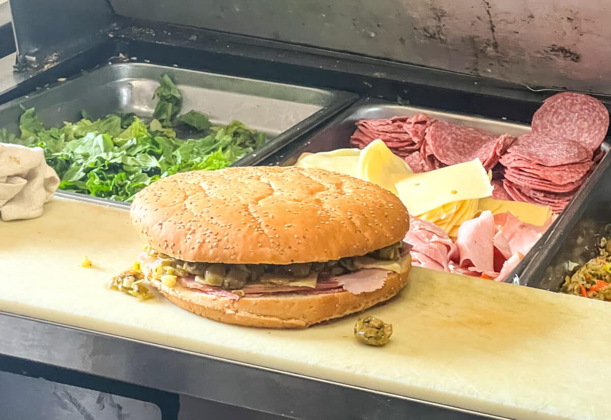 A sandwich on a cutting board.