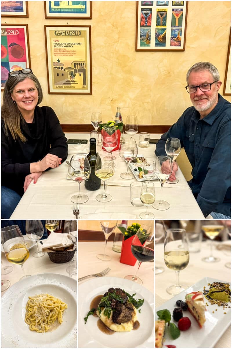 Two people sit at a restaurant table with wine glasses and plates of food, including pasta, meat with potatoes, and dessert, in a warmly lit dining setting.
